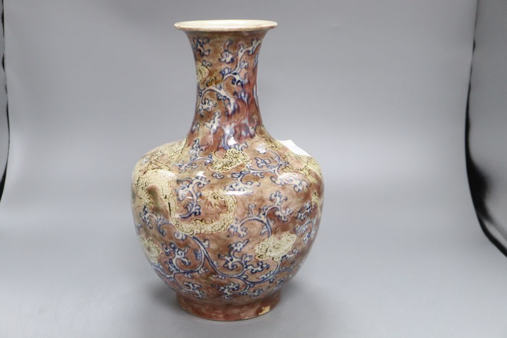 A Chinese underglaze blue and copper red dragon crackleglaze vase, height 31.5cm